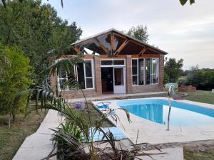 Swimmingpoolen hos eller tæt på La Posada de La Lechuza Apart Hotel