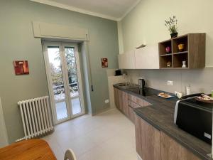 Η κουζίνα ή μικρή κουζίνα στο La Casa in Piazza