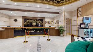 Posezení v ubytování Al Ansar Platinum Hotel فندق الأنصار بلاتينوم