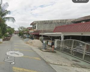 an empty street in front of a building at PD getaway in Port Dickson