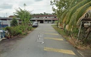 a street with a car parked on the road at PD getaway in Port Dickson
