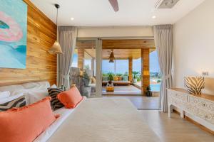 Ένα ή περισσότερα κρεβάτια σε δωμάτιο στο Hidden Gem The Palms 6Br Sea View Private Pool +92 φωτογραφίες