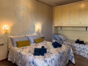 Ένα ή περισσότερα κρεβάτια σε δωμάτιο στο Terrazza vista mare-Parcheggio gratuito -3Min A14 -Mastrangelo Beach