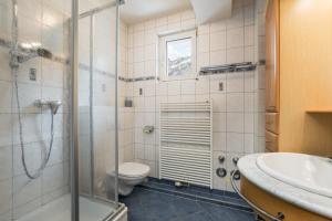 Ένα μπάνιο στο Appartement Zentral