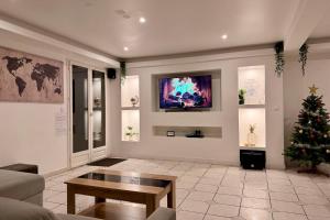 Μια τηλεόραση ή/και κέντρο ψυχαγωγίας στο Clos des chênes +64 φωτογραφίες