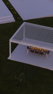 a rendering of a white bench with lights on it at OLYN VILLAS in Nikiti