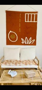 En eller flere senge i et værelse på Maison Beauséjour