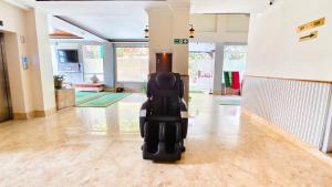 a suitcase sitting on the floor in a hallway at The Z Retreat & Spa - Swimming Pool & Free Parking - Near Tashi ViewPoint in Gangtok +56 photos