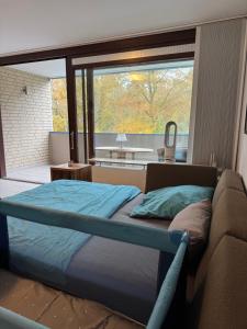 Postel nebo postele na pokoji v ubytování Ferienwohnung Meerzeit Mardorf