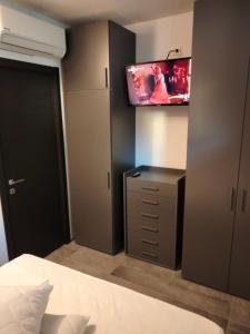 Giường trong phòng chung tại HB Appartamenti Suite +3 ảnh