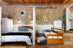 Ένα ή περισσότερα κρεβάτια σε δωμάτιο στο Monte Viana