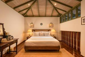 a bedroom with a large bed in a room at Ridee Kandy in Kandy