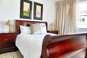 Ένα ή περισσότερα κρεβάτια σε δωμάτιο στο Khanimambo Guest house