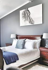 Ένα ή περισσότερα κρεβάτια σε δωμάτιο στο Khanimambo Guest house