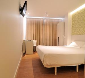 Μια τηλεόραση ή/και κέντρο ψυχαγωγίας στο Deniké Grupo Atalaia