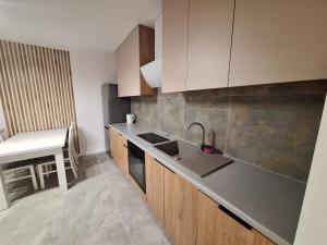 Η κουζίνα ή μικρή κουζίνα στο Cashmere Stay Suwalki