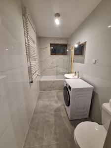 Ένα μπάνιο στο Cashmere Stay Suwalki