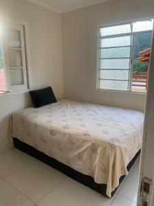 Кровать или кровати в номере Chácara da Sol 10 pessoas +35 фотографий