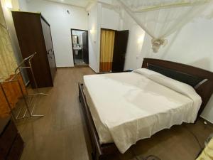 Кровать или кровати в номере White Villa