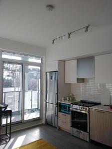 Kuchyň nebo kuchyňský kout v ubytování Cozy holiday home