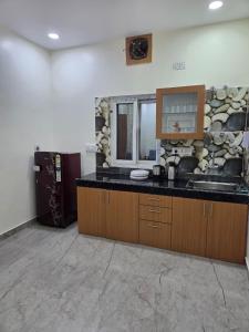 Η κουζίνα ή μικρή κουζίνα στο D-Avana Bliss Retreat Homestay, Ranchi