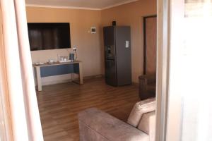 Kuchyň nebo kuchyňský kout v ubytování Royal Gidlas Guesthouse