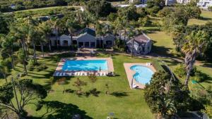 an aerial view of a house with a swimming pool at Sandi-Lee's Casa Bella in Plettenberg Bay