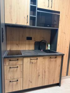 Køkken eller tekøkken på Spoko Room 23 Szczytno