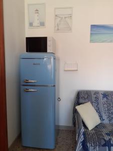 Kuchyň nebo kuchyňský kout v ubytování Il Faro