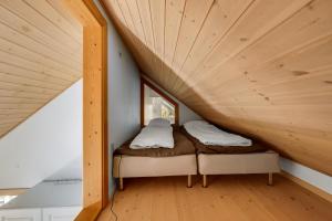 Postel nebo postele na pokoji v ubytování Feriehus 1150