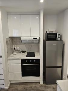 Køkken eller tekøkken på La suite - Rue droite + 8 billeder