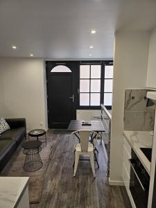 Køkken eller tekøkken på La suite - Rue droite