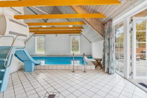 Bazén v ubytování Feriehus 2023 nebo v jeho okolí