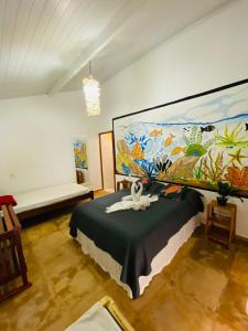 Ένα ή περισσότερα κρεβάτια σε δωμάτιο στο Casa do velejador +82 φωτογραφίες