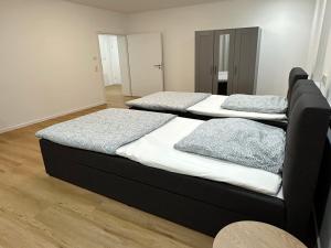 Ένα ή περισσότερα κρεβάτια σε δωμάτιο στο Cozy Apartment in Rösrath