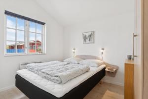 Giường trong phòng chung tại Feriehus 3005