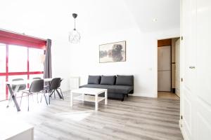 Et opholdsområde på Apartamento Green City Deco