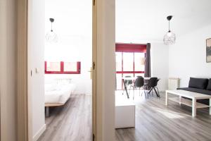 En eller flere senge i et værelse på Apartamento Green City Deco