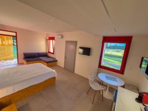 Postel nebo postele na pokoji v ubytování Ktima Lomvàrdia