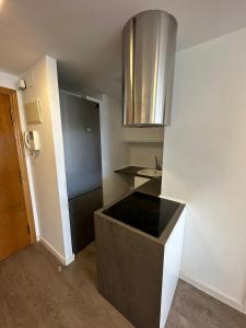 Η κουζίνα ή μικρή κουζίνα στο Apto con encanto en primera línea de playa , Cullera