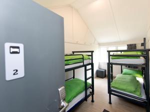 Ένα ή περισσότερα κρεβάτια σε δωμάτιο στο YHA Jordans - Partner