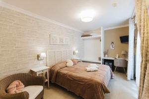 Ένα ή περισσότερα κρεβάτια σε δωμάτιο στο Mediterranea Sea House