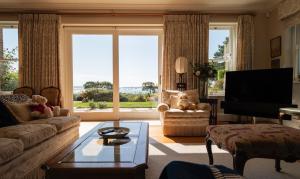 TV a/nebo společenská místnost v ubytování Nash Point