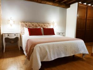 Postel nebo postele na pokoji v ubytování Vila As Pedras