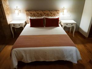 Postel nebo postele na pokoji v ubytování Vila As Pedras