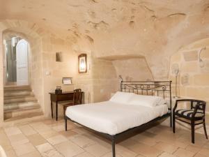 Postel nebo postele na pokoji v ubytování Hotel San Giorgio