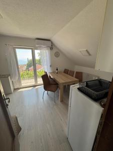 Kuchyň nebo kuchyňský kout v ubytování Apartament Loza Bar