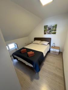 Postel nebo postele na pokoji v ubytování Apartament Loza Bar