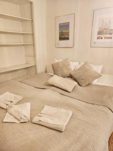 Postel nebo postele na pokoji v ubytování Heart of Old Town