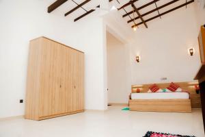 Ένα ή περισσότερα κρεβάτια σε δωμάτιο στο Blue Sky Villa Ahangama
